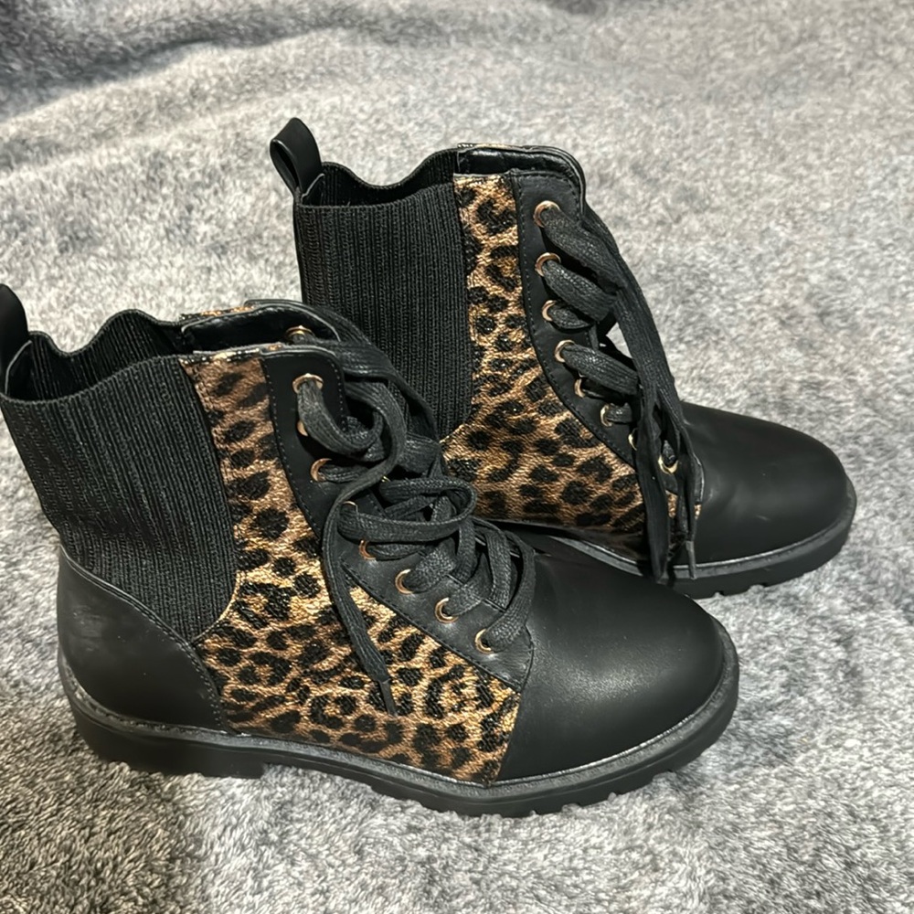 Animal print and Black Lug Boots. Size 9 with sticker tag on bottom.